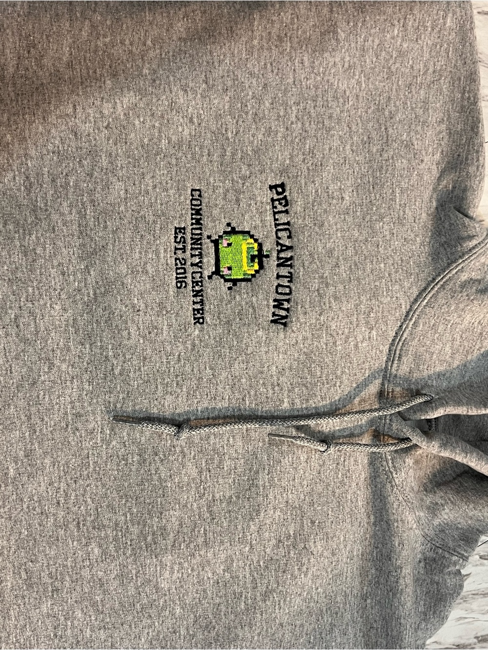 Stardew Valley Junimo Gray Hooded Sweater with Embroidered Logo